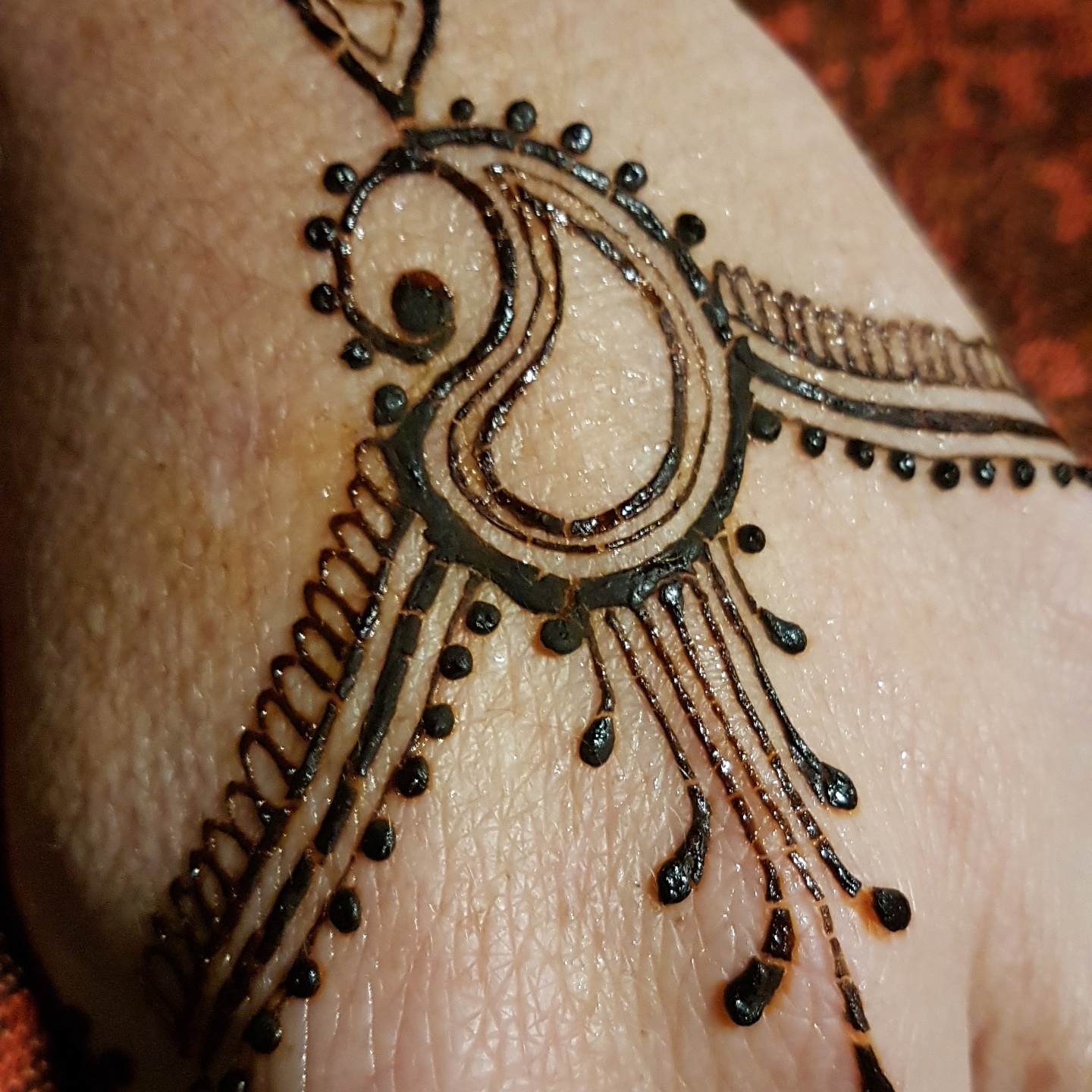 henna paste sealed with sugary syrup